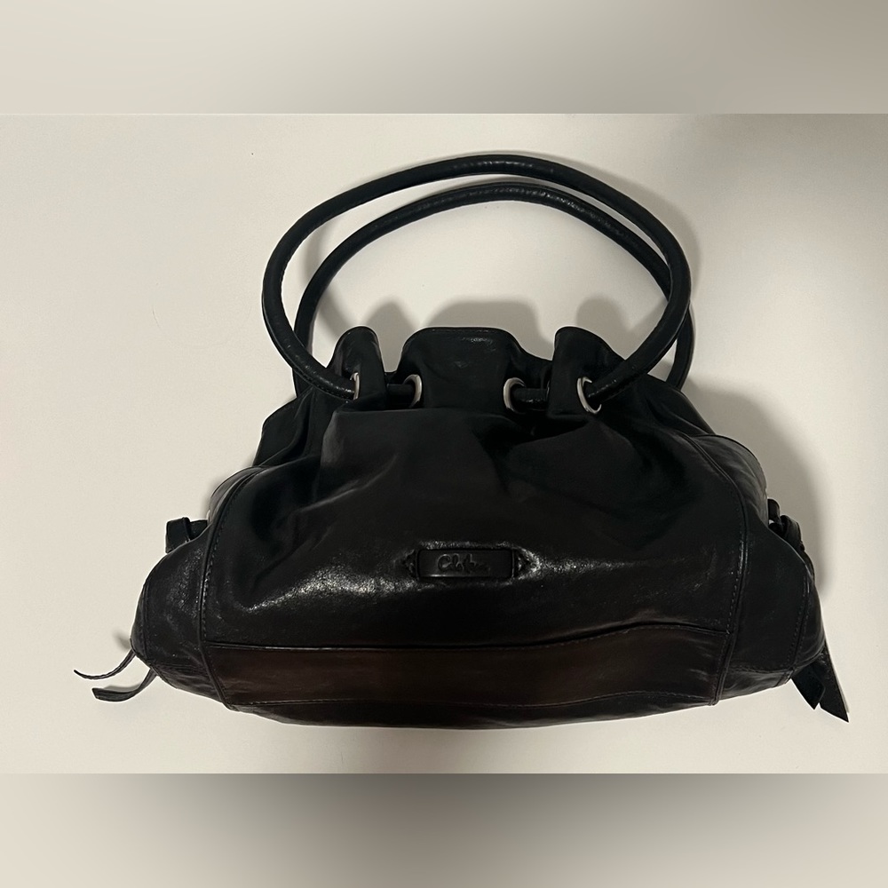 Cole Haan Black Leather Drawstring Bucket Bag.